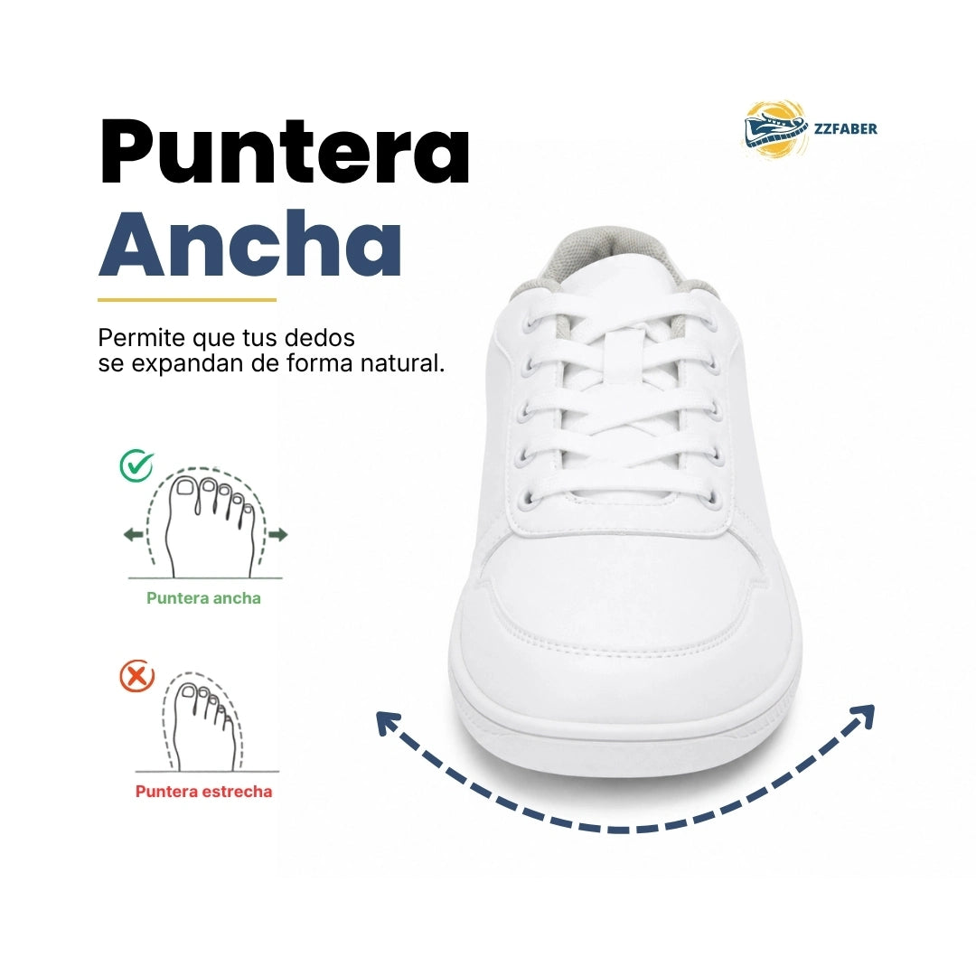 Calzado barefoot blanco ZZFABER Easy I doblado por completo, destacando su suela de caucho flexible y horma ancha para separar los dedos en Chile.