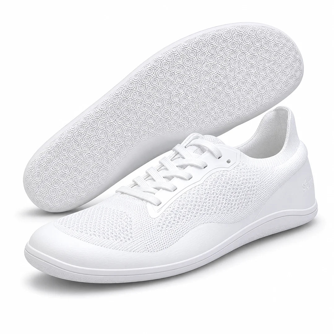 Suela flexible de Sowilo Kenaz blanca vista inferior con patrón adherente.